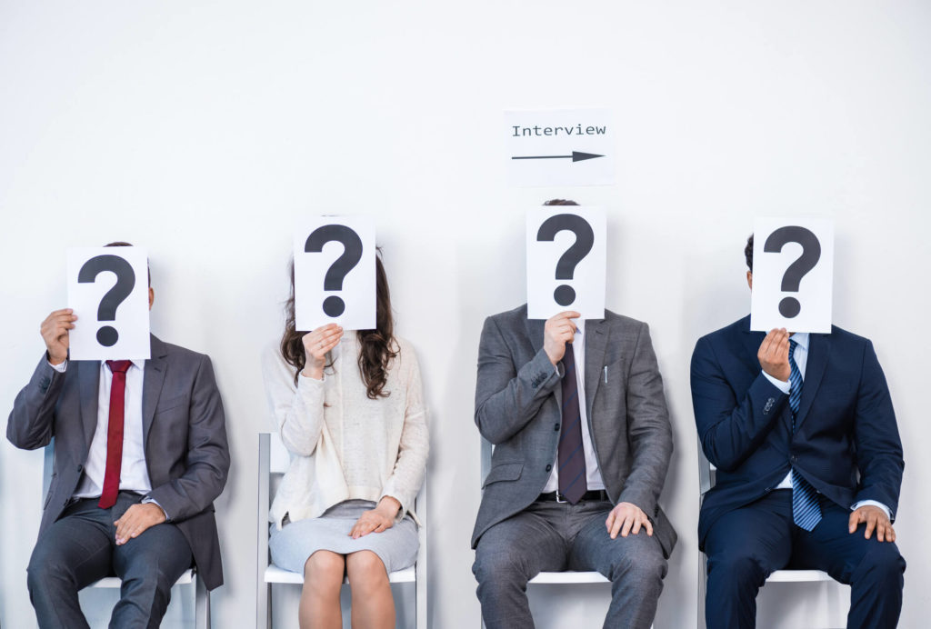 inclusive hiring interview process people sitting and waiting